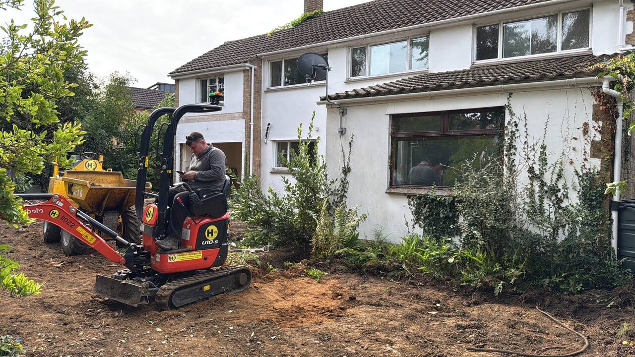 Blenheim Drive before works began, front exterior with excavator