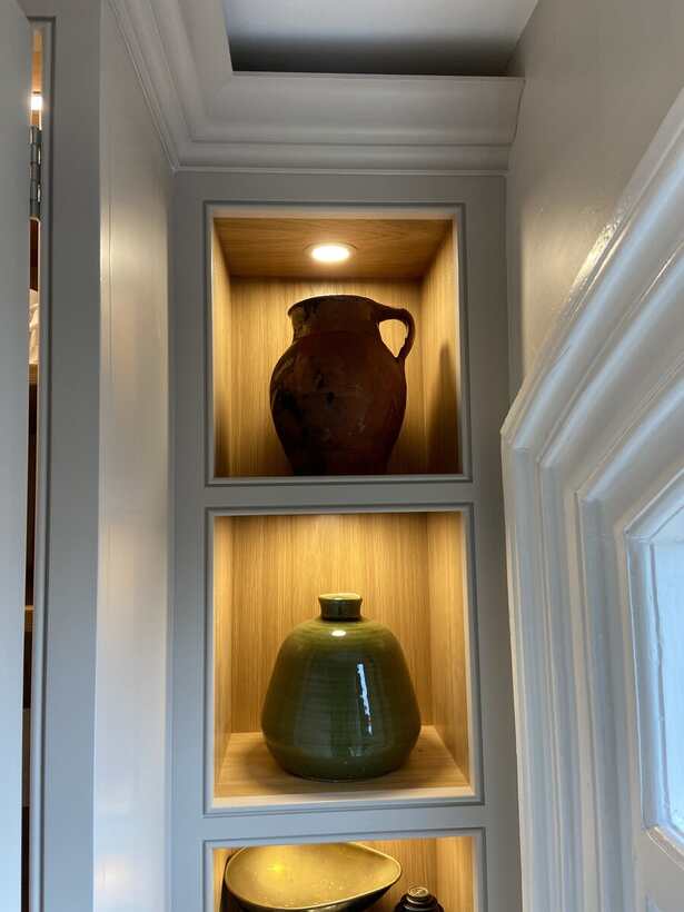 Built-in alcove joinery with traditional coving detail